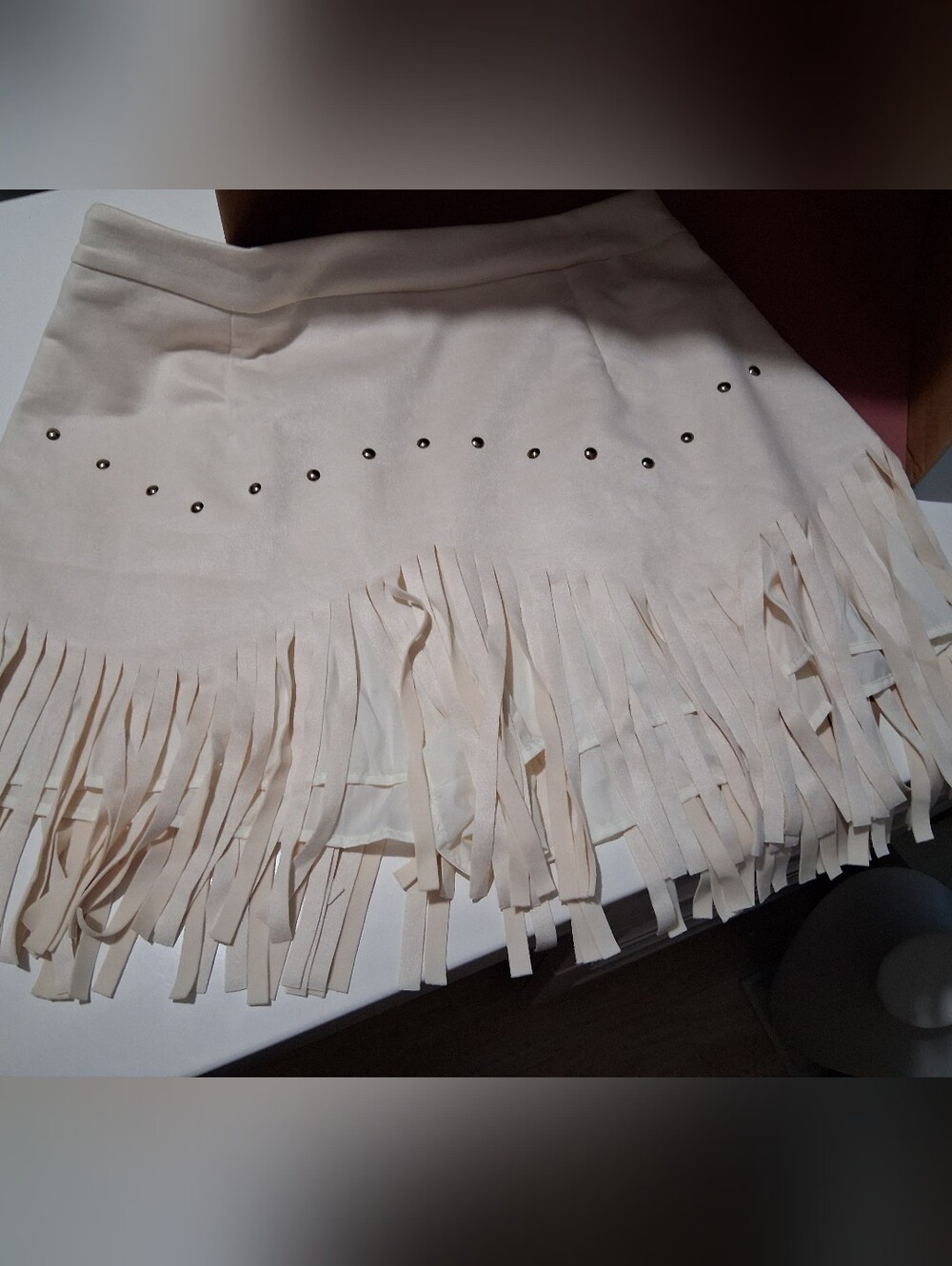 Fringed Mini Skirt with Stud Accent in Beige